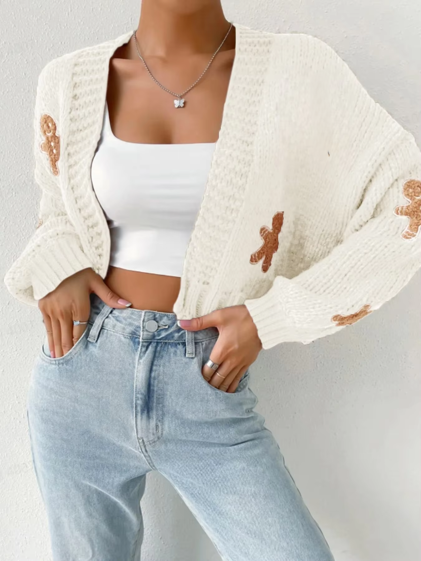 Maya – Cookie Man V-Neck Sweater